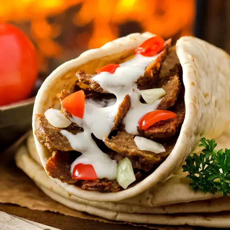 Medicine Hat Pizza signature dishes — fresh pizza and donair